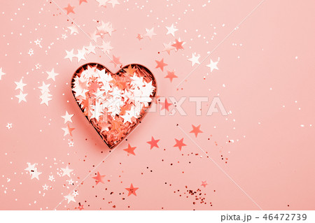 Heart with sparkles on Living Coral background. Heart with sparkles on Living Coral background. 46472739