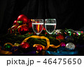 Two glasses of champagne with a Christmas decor  46475650