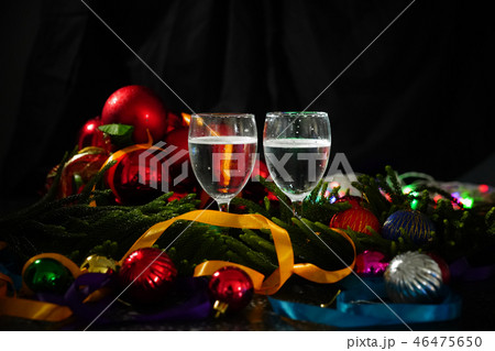 Two glasses of champagne with a Christmas decor  46475650