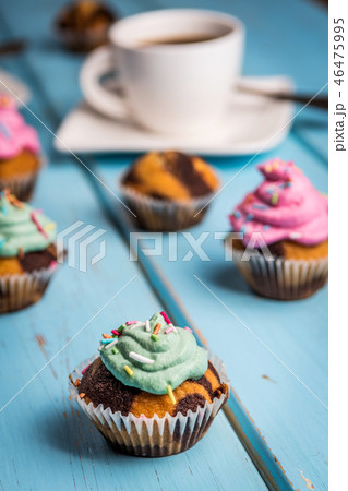 Chocolate cupcake with cream 46475995