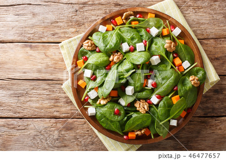 Delicious dietary salad of pumpkin, baby spinach Delicious dietary salad of pumpkin, baby spinach 46477657