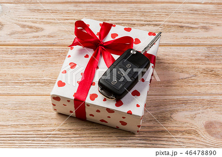 holiday handmade present in paper with red hearts 46478890
