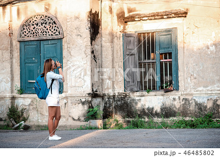 Asian Woman Traveler Carrying Backpack on Vacation 46485802