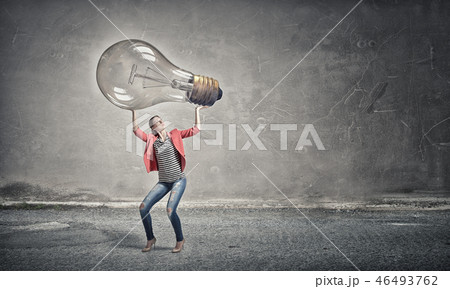Girl with big glass bulb 46493762