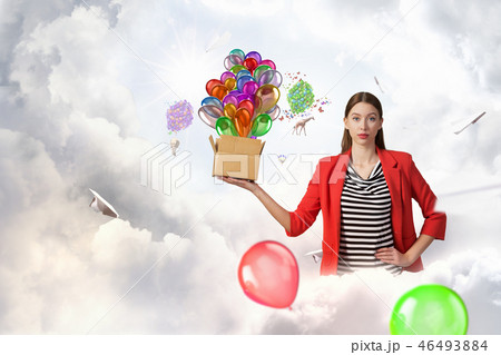 Girl holding box in hand Girl holding box in hand 46493884