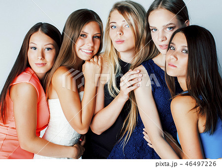 many girlfriends hugging celebration on white background, smilin 46497226