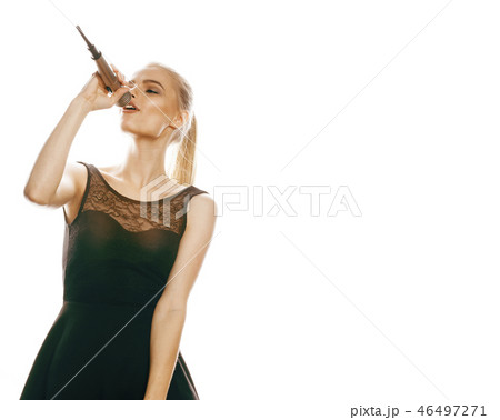 young pretty blond woman singing in microphone isolated close up 46497271