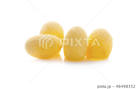 yellow thai silkworm cocoons pile isolated 46498352