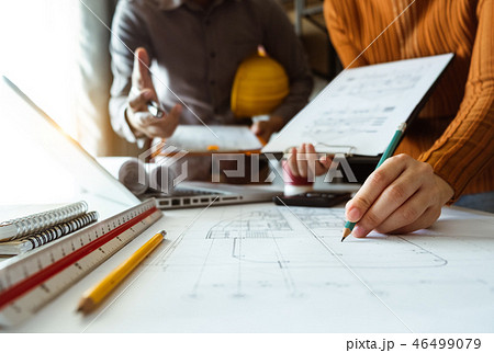 Creative architect projecting on the big drawings 46499079