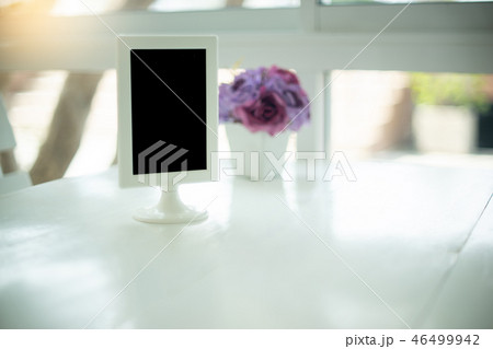 little black board on the white table little black board on the white table 46499942