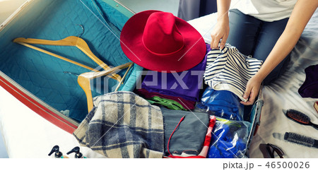 girl packing the luggage prepare for her trip girl packing the luggage prepare for her trip 46500026