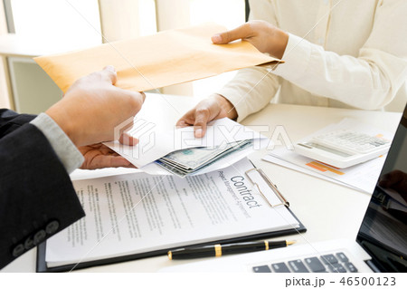 Business man give bribe to the officer Business man give bribe to the officer 46500123