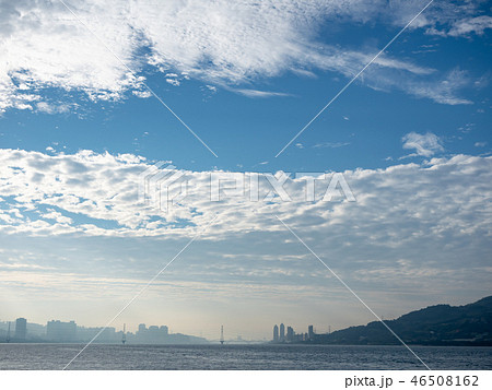 Misty landscape with river, bridge and buildings Misty landscape with river, bridge and buildings 46508162