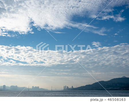 Misty landscape with river, bridge and buildings 46508163