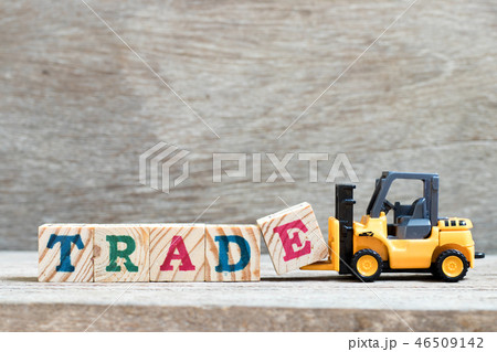 Toy forklift hold letter block e to word trade Toy forklift hold letter block e to word trade 46509142