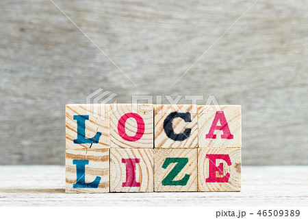 Letter block in word localize on wood background 46509389