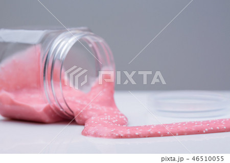 Mucus in the bank. Slime flows from the jar. 46510055