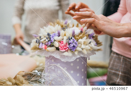The process of making a bouquet. Colorful bouquet of different dried flowers deadwood flowers in the 46510967