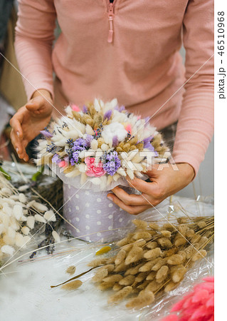 The process of making a bouquet. Colorful bouquet of different dried flowers deadwood flowers in the The process of making a bouquet. Colorful bouquet of different dried flowers deadwood flowers in the 46510968