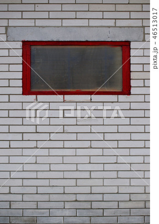 Old brick wall with window. 46513017