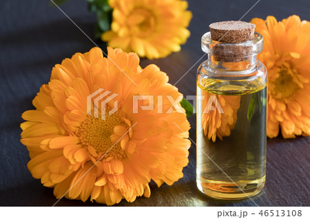 A bottle of calendula essential oil 46513108