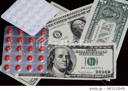 Pills in blister packaging and american dollars Pills in blister packaging and american dollars 46522048