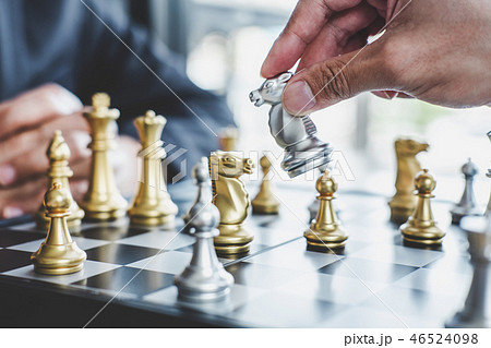Two businessman playing chess game to plan strategy for success, Two businessman playing chess game to plan strategy for success, 46524098