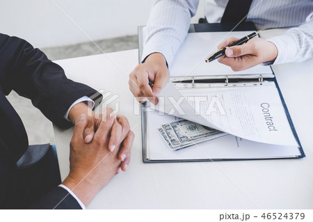 Bribery and corruption concept, bribe in the form of dollar bill Bribery and corruption concept, bribe in the form of dollar bill 46524379