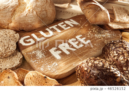 Gluten free food. Various pasta, bread and snacks on wooden background from top view Gluten free food. Various pasta, bread and snacks on wooden background from top view 46526152