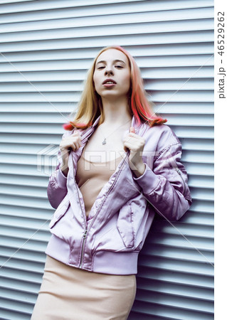 young pretty fashion dressed blong teenage girl posing friendly young pretty fashion dressed blong teenage girl posing friendly 46529262