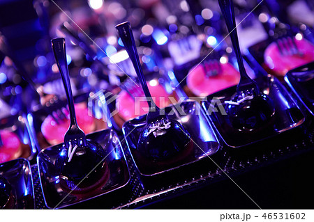 Beautifully decorated catering banquet table with different food snacks. Beautifully decorated catering banquet table with different food snacks. 46531602