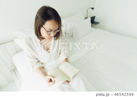 Asian girl Read books after waking up in the 46542599