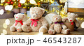 Family of teddy bears siting under the christmas tree with presents. Long banner 46543287