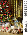 Family of teddy bears siting under the christmas tree with presents 46543299