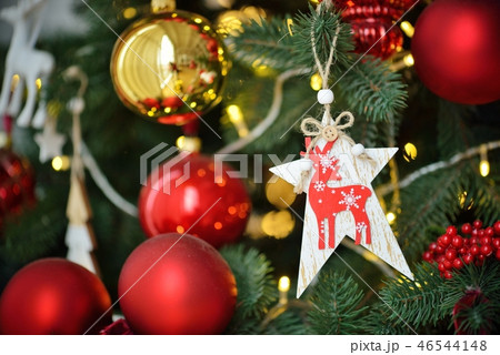 Decorated Christmas tree on blurred, sparkling and fairy background 46544148