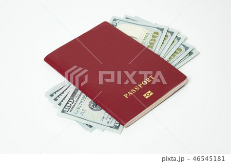 Foreign biometric passport with dollars isolated on a white background. Five bills for a hundred Foreign biometric passport with dollars isolated on a white background. Five bills for a hundred 46545181