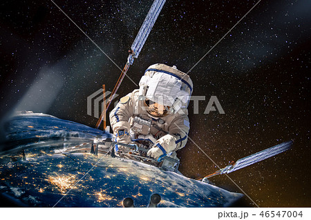 astronaut repairman clings to the planet earth 46547004