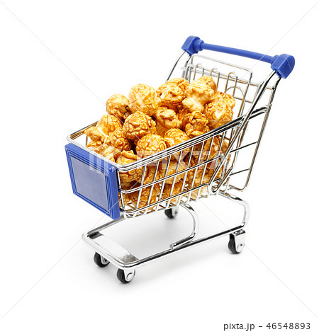 Shopping cart filled with the sweet popcorn 46548893