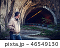 a man out in a tunnel 46549130