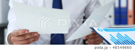 Group of people hold in arms financial papers solve and discuss problem Group of people hold in arms financial papers solve and discuss problem 46549660