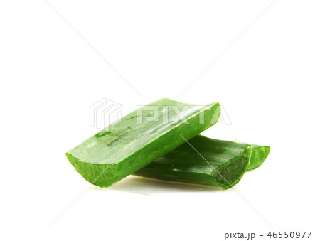 Close-Up Of Aloe Vera Slice On White Background Close-Up Of Aloe Vera Slice On White Background 46550977