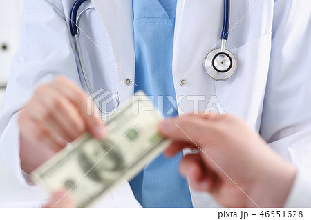 Female doctor hold in hands bunch 46551628