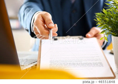 Male arm in suit offer contract form on clipboard 46551848