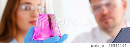 Female technician arms in protective gloves Female technician arms in protective gloves 46552195