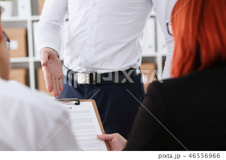 Male arm in shirt offer contract form on clipboard 46556966