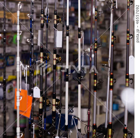 Image of stand with bright fishing rods in the sports shop Image of stand with bright fishing rods in the sports shop 46557092