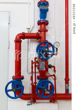 Red pipeline with blue valves Red pipeline with blue valves 46557206