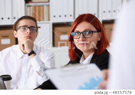 Male hands hold clipboard pad with statistics Male hands hold clipboard pad with statistics 46557579
