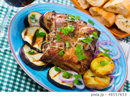 Roasted pork carre with vegetables Roasted pork carre with vegetables 46557653