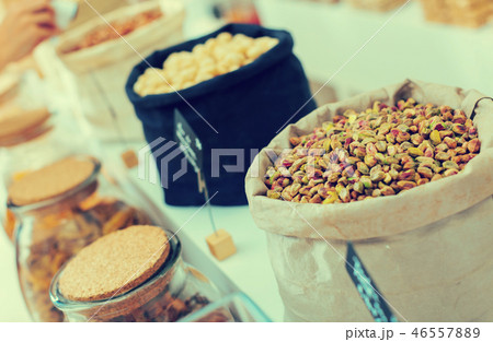 Image of green pistachios in container Image of green pistachios in container 46557889